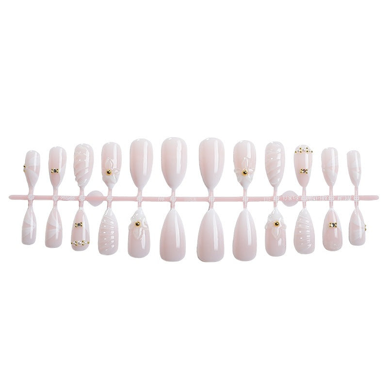 Artificial nail set with elegant floral design and luxurious accents Stornfield