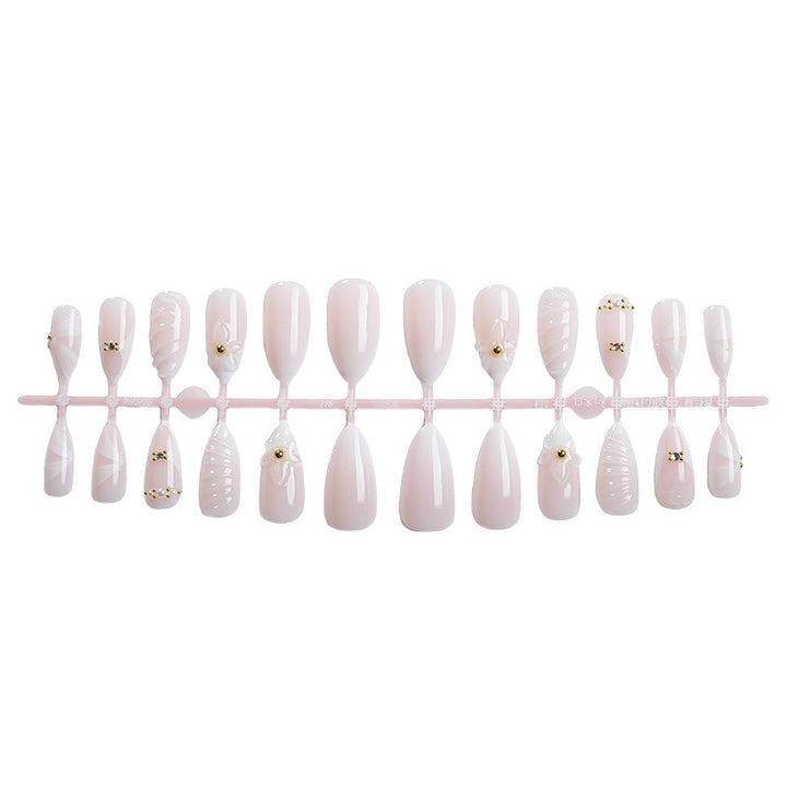 Artificial nail set with elegant floral design and luxurious accents Stornfield