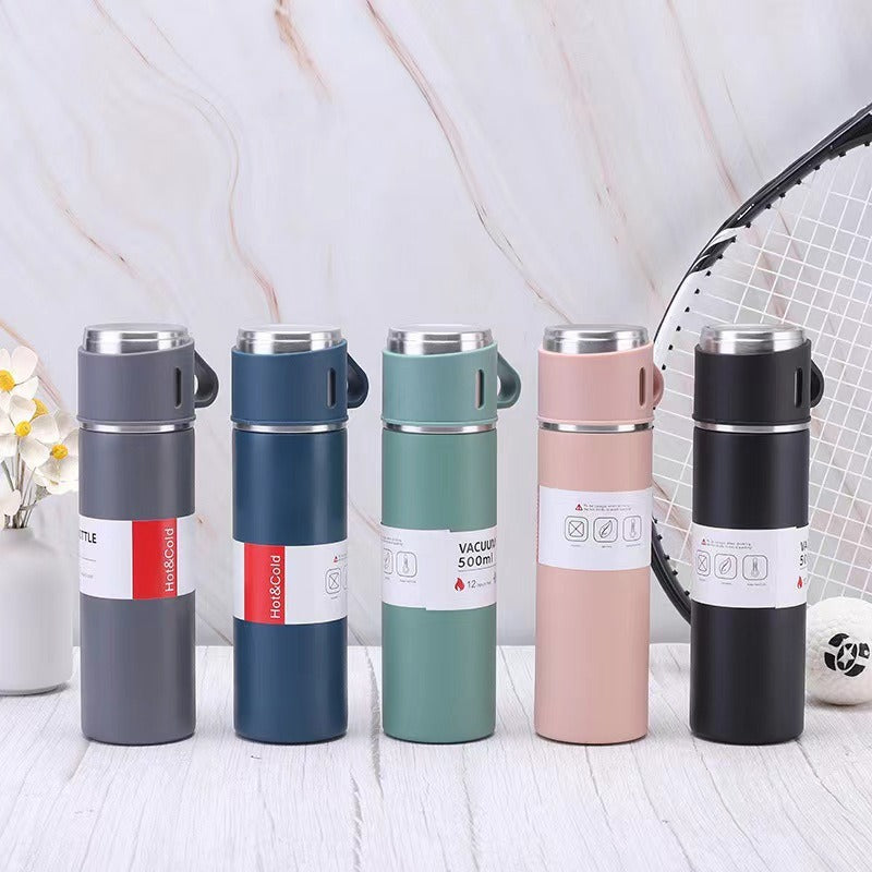 Women’s stainless steel vacuum flask with two accompanying cups Stornfield