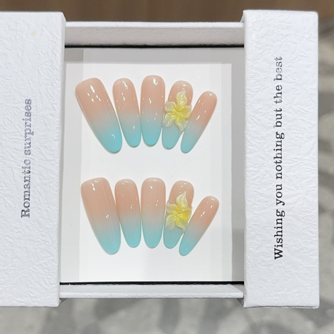 Artificial nails with enchanting ombre effect and floral accents Stornfield