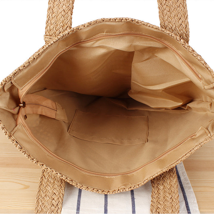 Eco-friendly straw tote bag with elegant tassel detail Stornfield