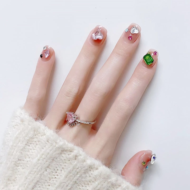 Acrylic nail set with sparkling 3D applications and beautiful heart designs Stornfield
