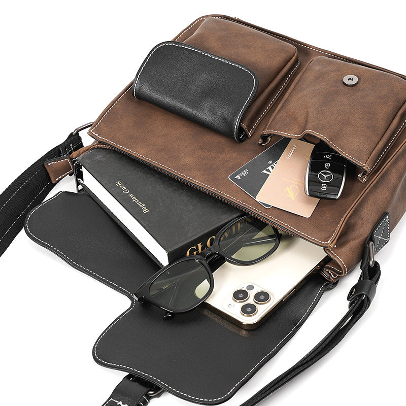 Robust shoulder bag with multiple external pockets Stornfield