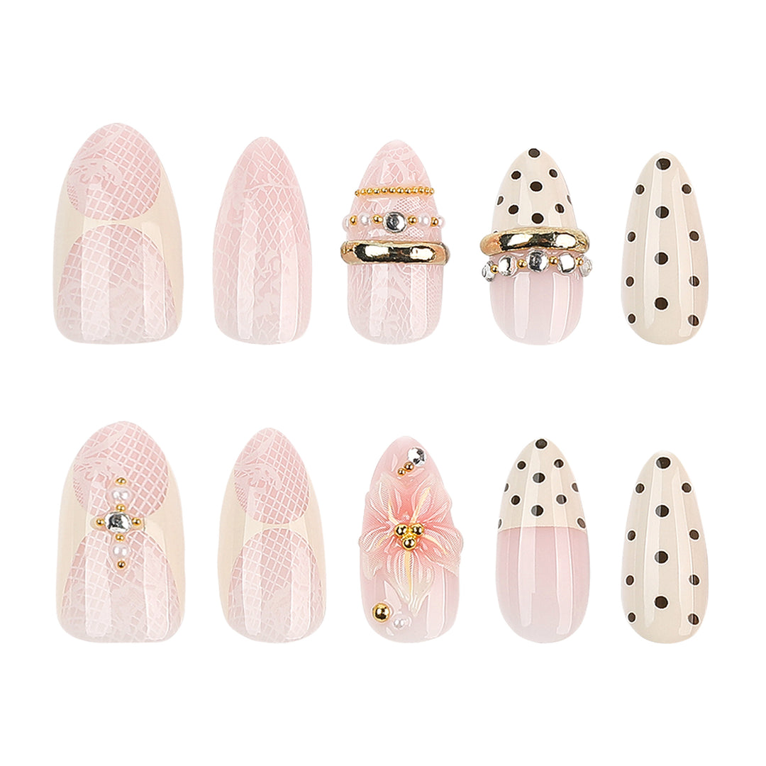 Artful Nail Extensions with Elegant Floral and Glitter Accents Stornfield