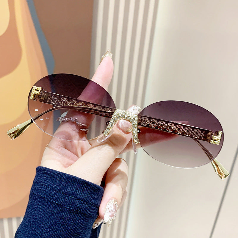 Women's sunglasses with glittering frame and oval lenses Stornfield