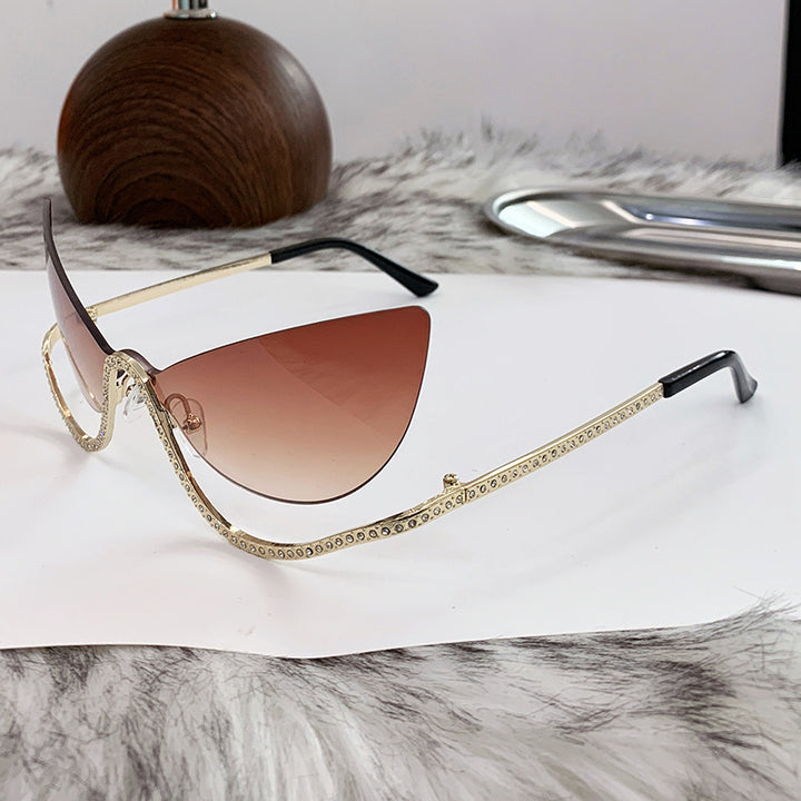 Women's extravagantly shaped Cat-Eye sunglasses with sparkling appliqués Stornfield