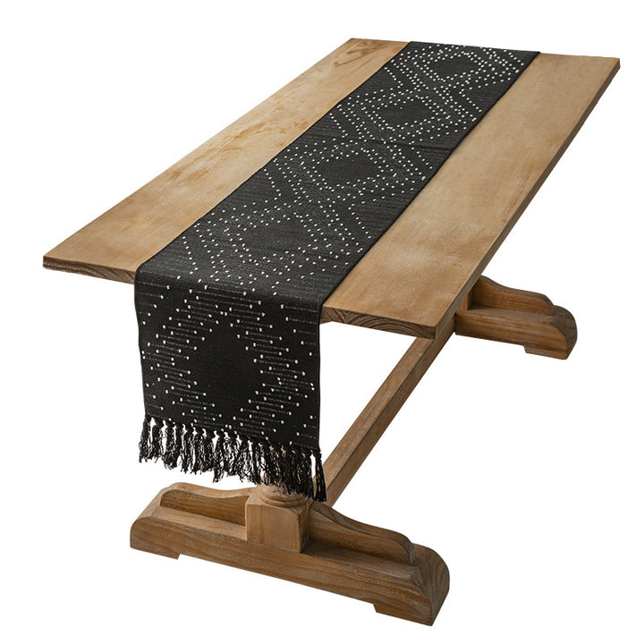 Handwoven table runner made of cotton blend with fringes and geometric dot jacquard Stornfield
