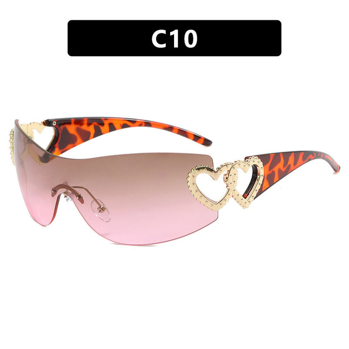 Ladies sporty sunglasses in trendy shield design with heart accents Stornfield