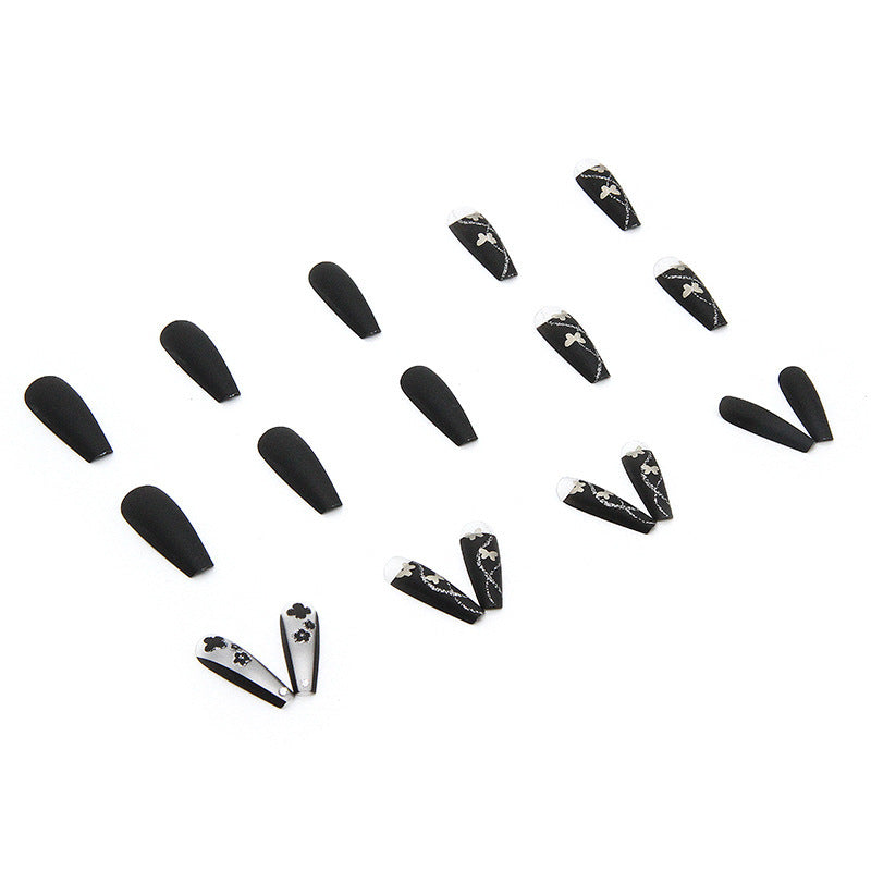 Art nail set with elegant butterfly and flower motifs Stornfield