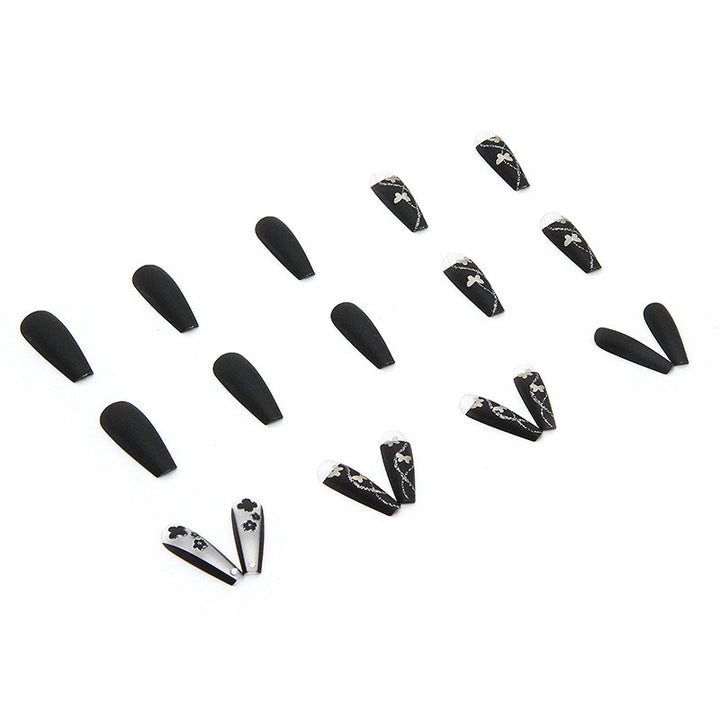 Art nail set with elegant butterfly and flower motifs Stornfield
