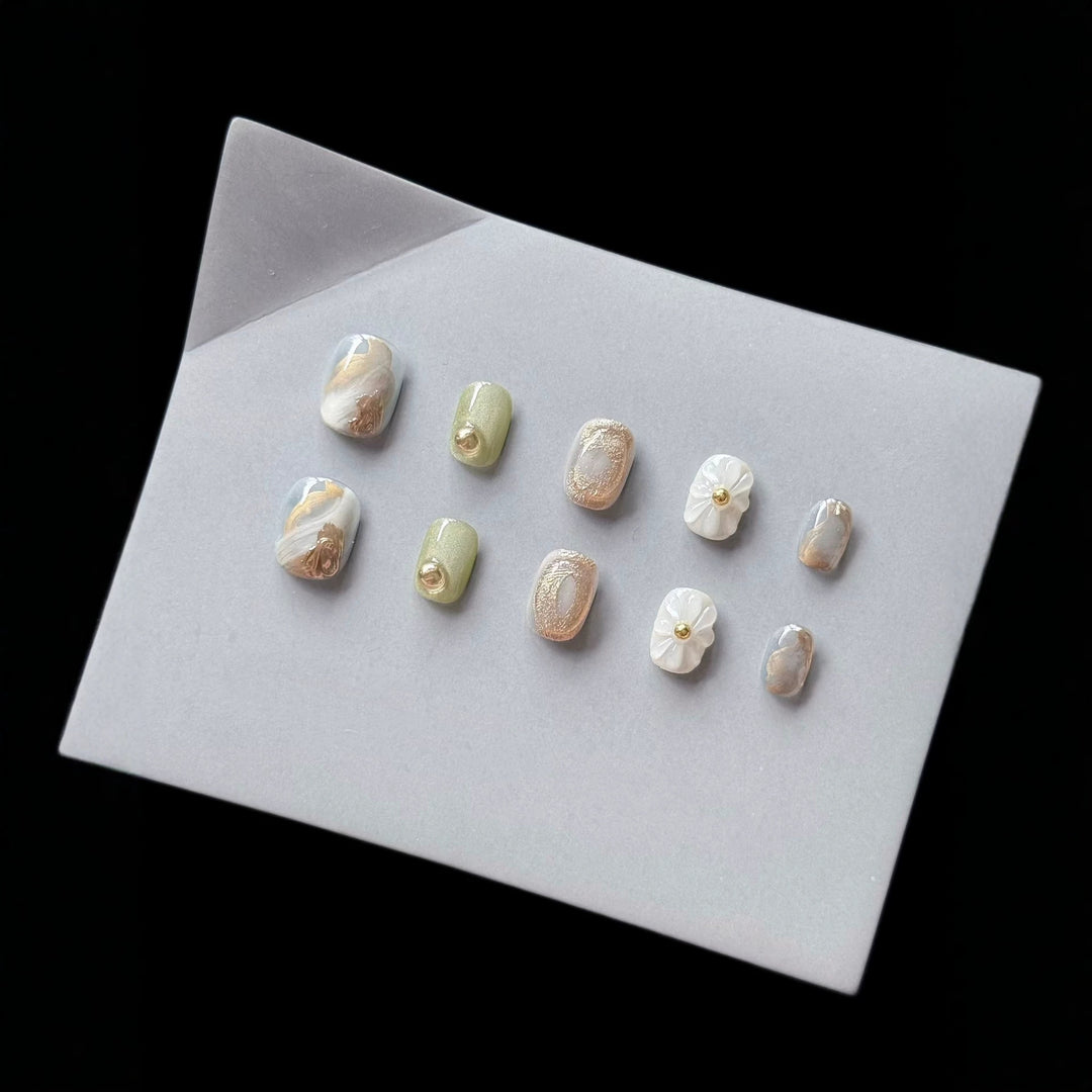 Premium Press-On Nail Art Set with Floral and Metallic Accents