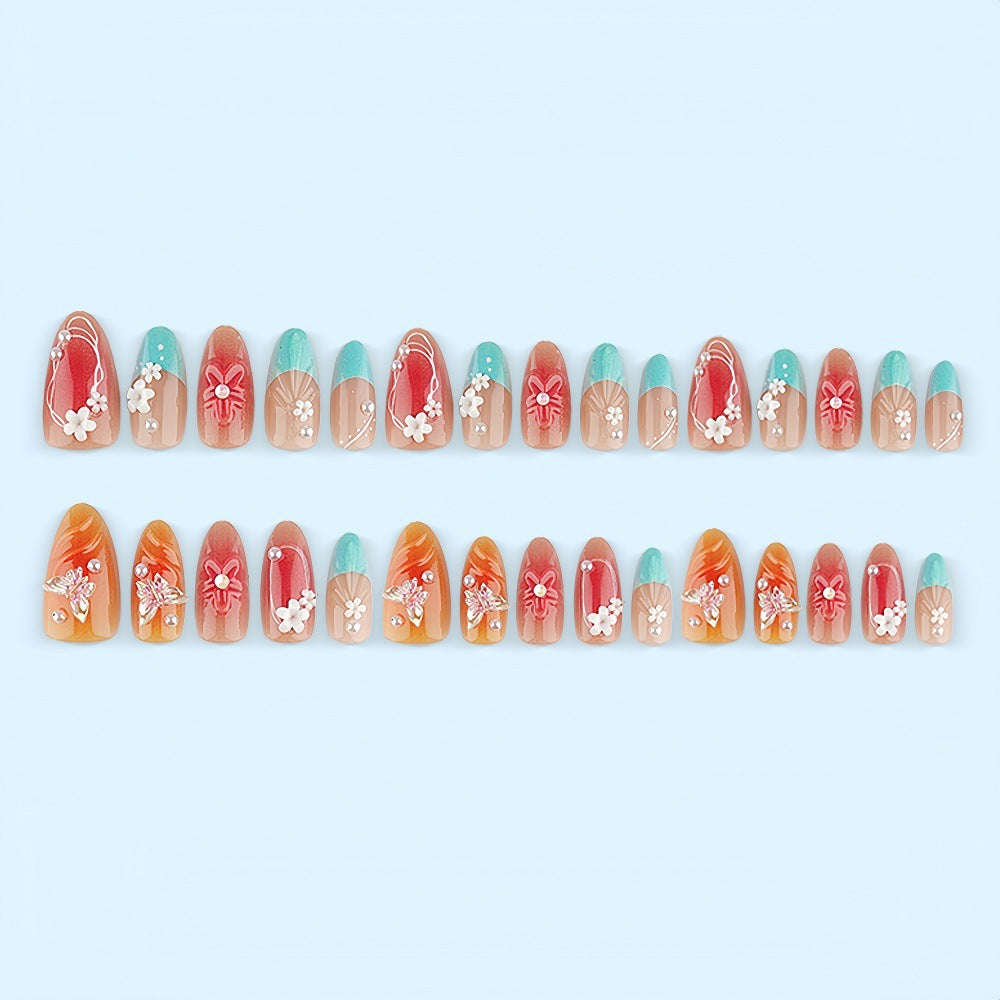 Artificial nail set with floral accents and glittering 3D applications Stornfield