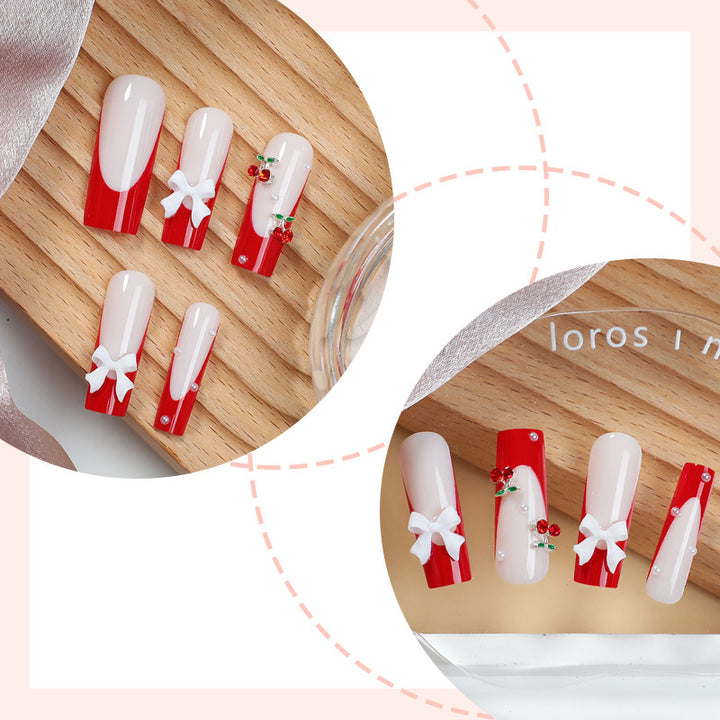 Creative nail set with festive cherry motifs Stornfield