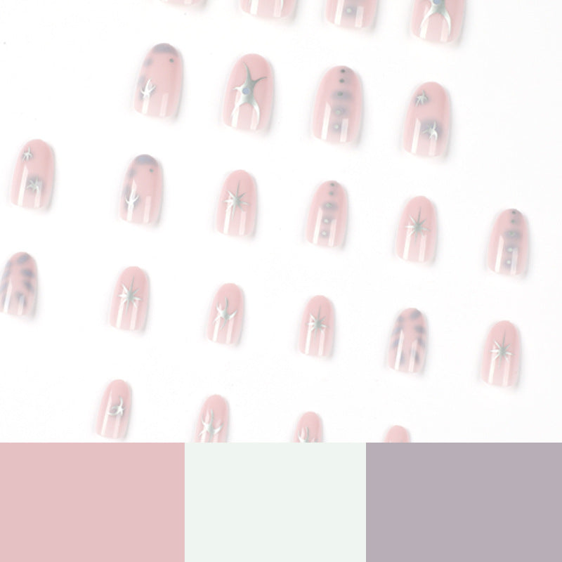 Elegant nail art with glamorous metal embellishments Stornfield