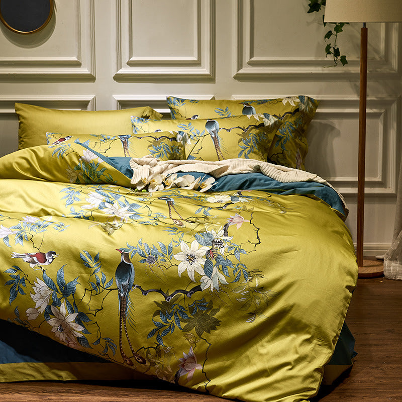 Cotton satin bedding set with watercolor flower print and reversible blanket