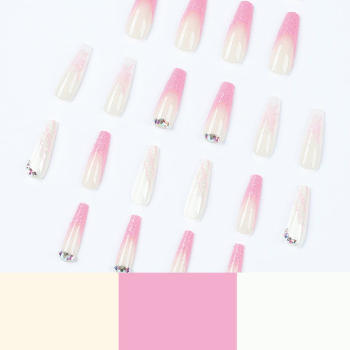 Artistic stiletto nails with glitter and snowflake design Stornfield