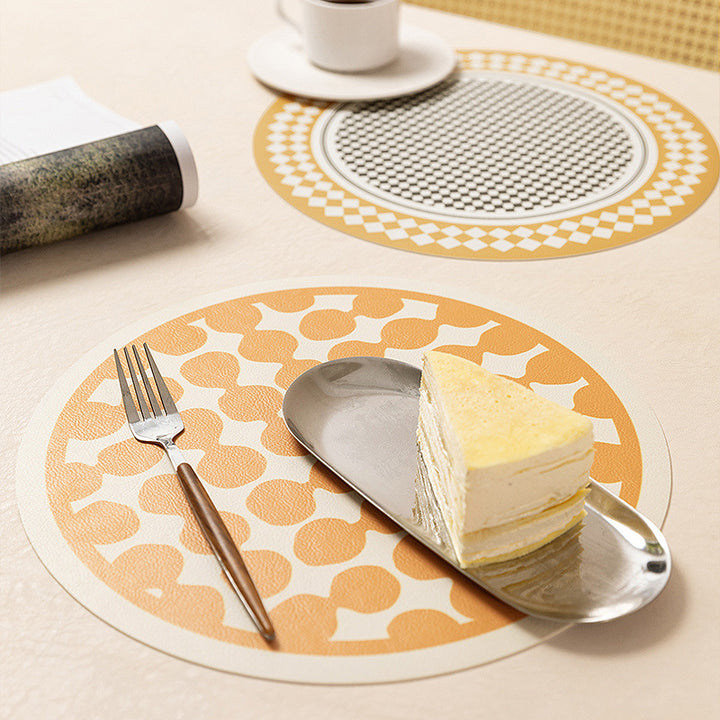Round wipeable table mat made of PVC with non-slip back and retro geometric pattern