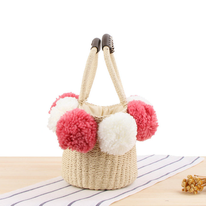 Basket bag with decorative pompons Stornfield