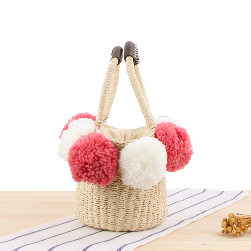 Basket bag with pompom decorated top edge Stornfield