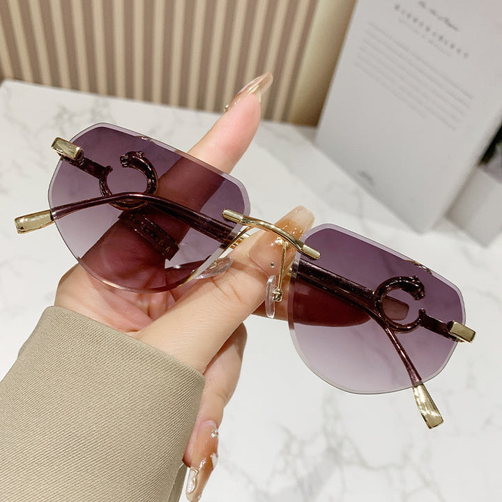 Women's trendy chic sunglasses in modern design with delicate metal frame Stornfield