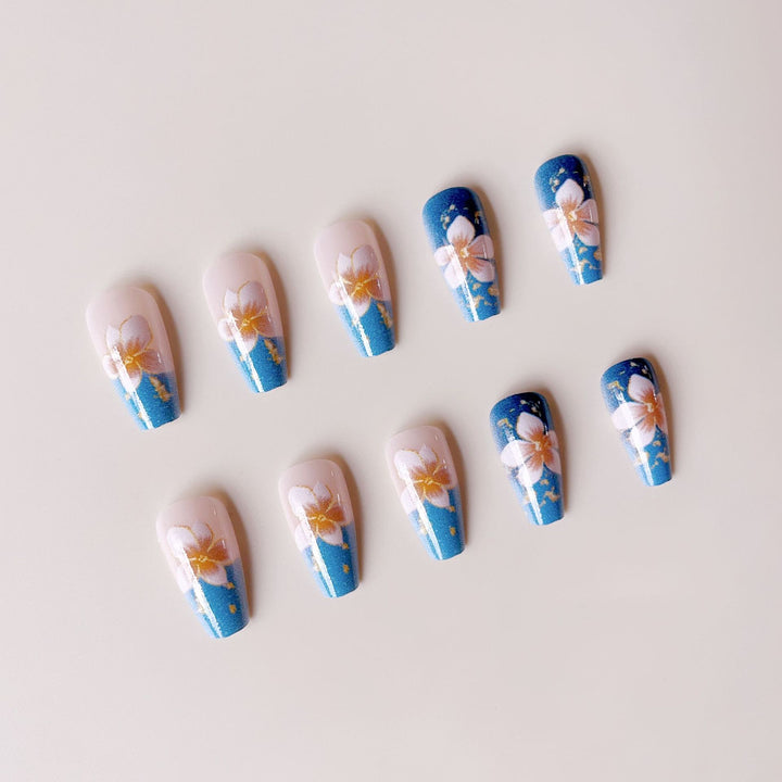 Artificial nail tips with floral accents and glitter Stornfield