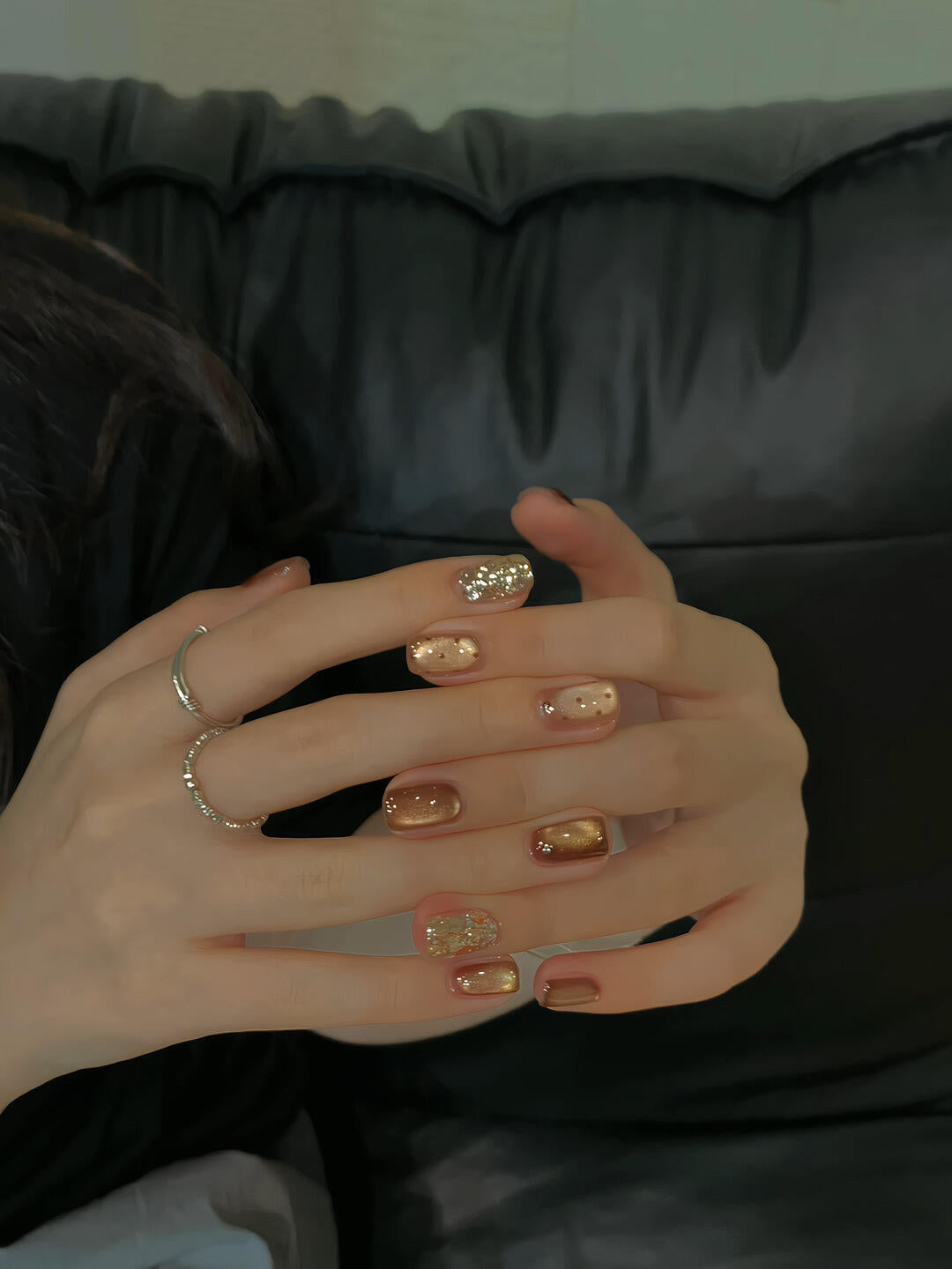 Elegant artificial nails with shimmering effects and sparkling accents Stornfield