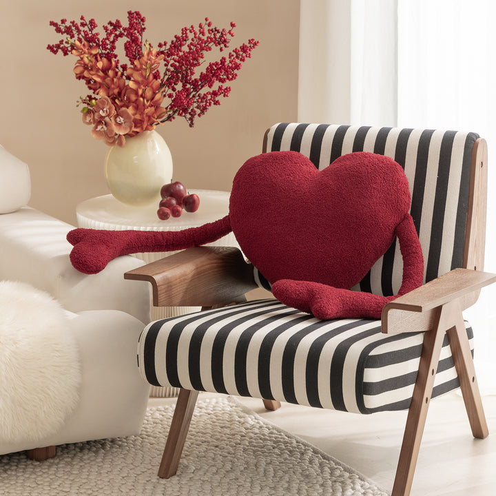 Heart-shaped cuddle cushion with extended arm applications Stornfield