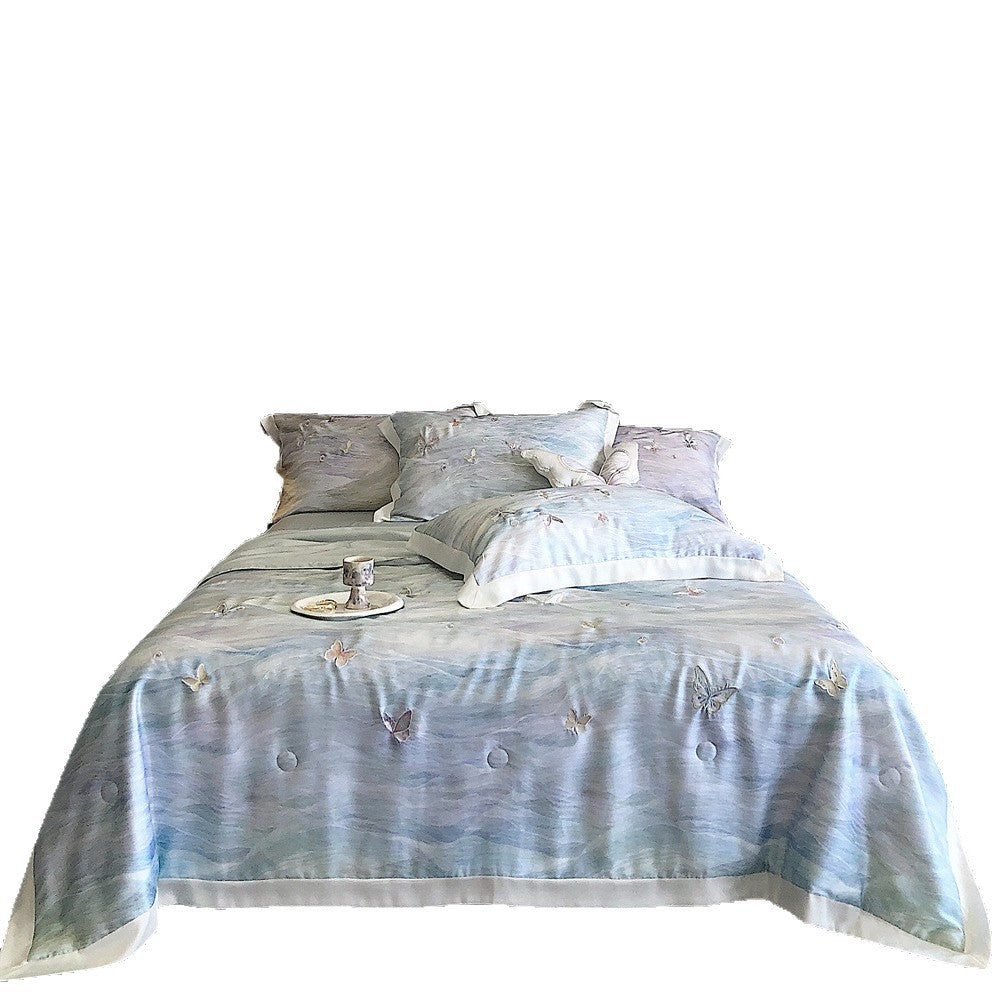 Luxurious satin bedding set with butterfly embroidery and decorative pillow