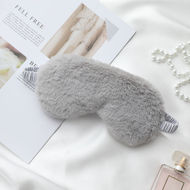 Women's fluffy ergonomic eye mask with adjustable satin band and soft faux fur cover Stornfield