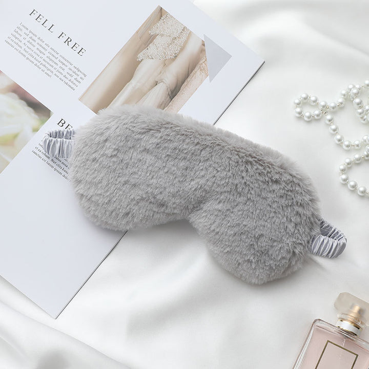 Women's fluffy ergonomic eye mask with adjustable satin band and soft faux fur cover Stornfield