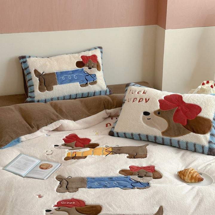 Cozy quilted bedspread with plush appliqués and matching pillowcases