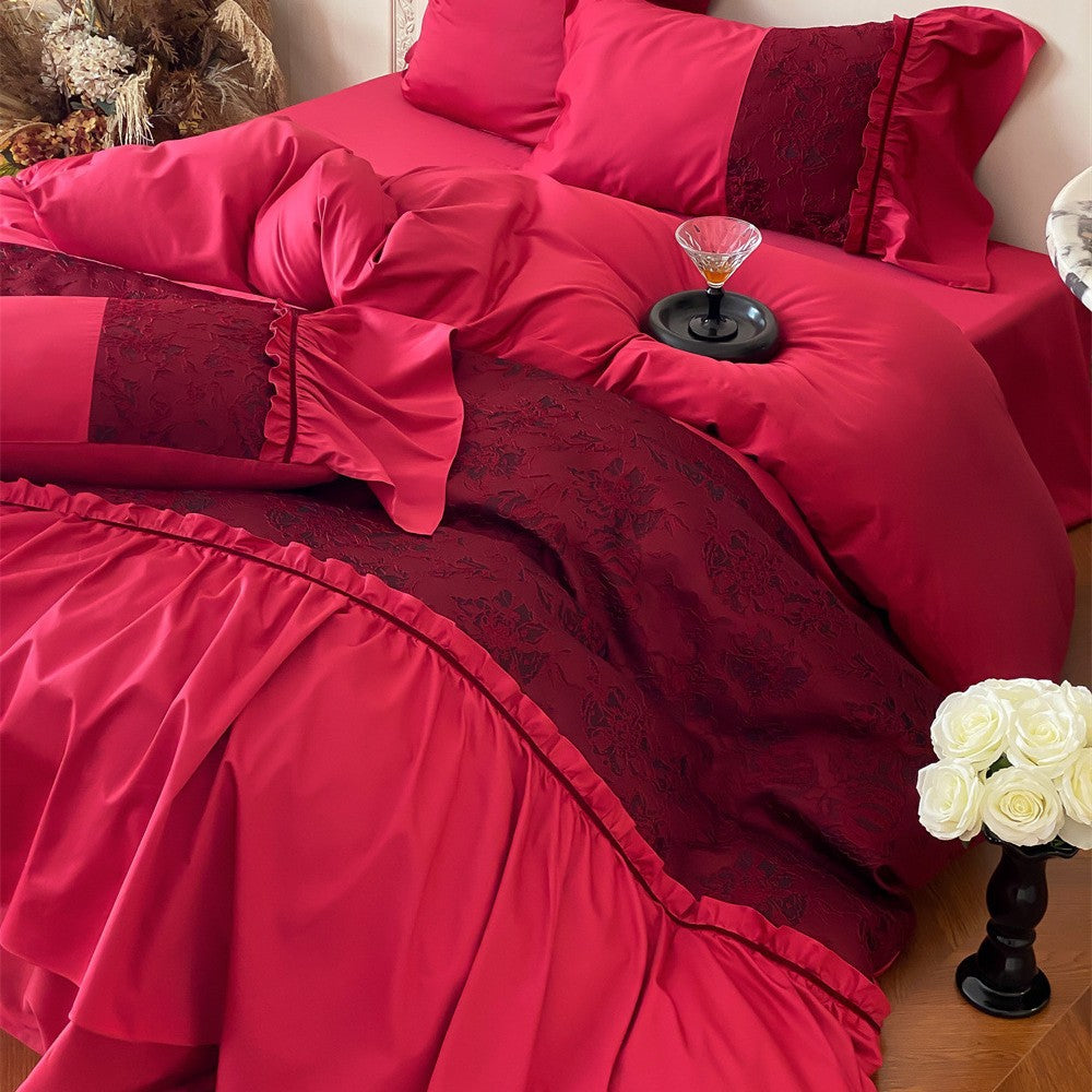 Luxurious satin bedding set with ruffles and lace appliqué