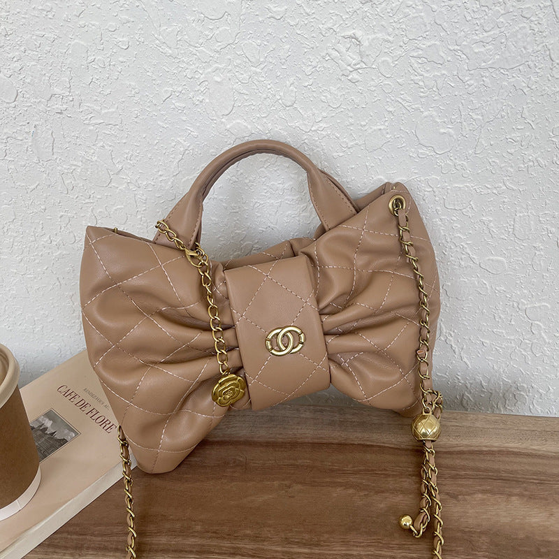 Quilted Bow Accent Handbag