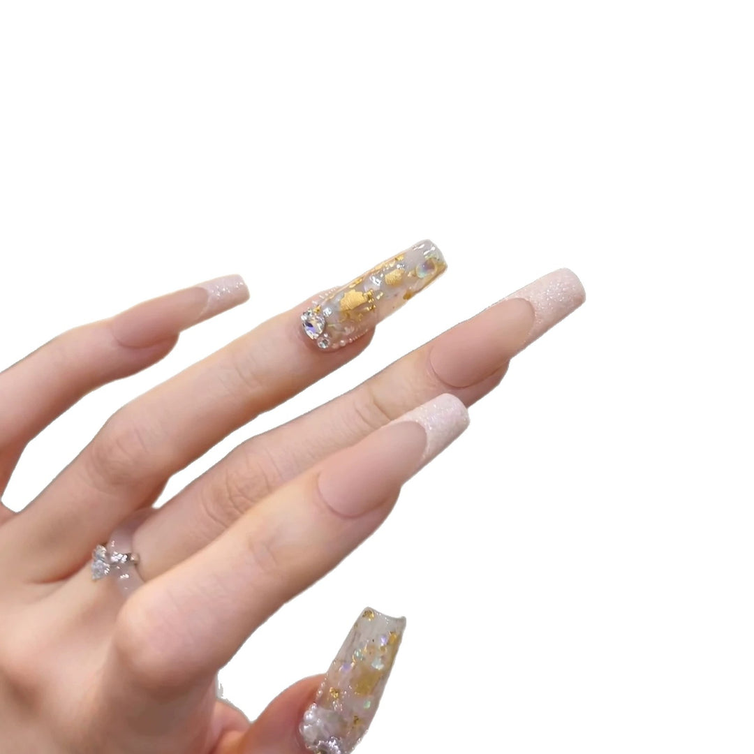 Luxurious Decorative Press-On Nail Set with Artistic Elements Stornfield