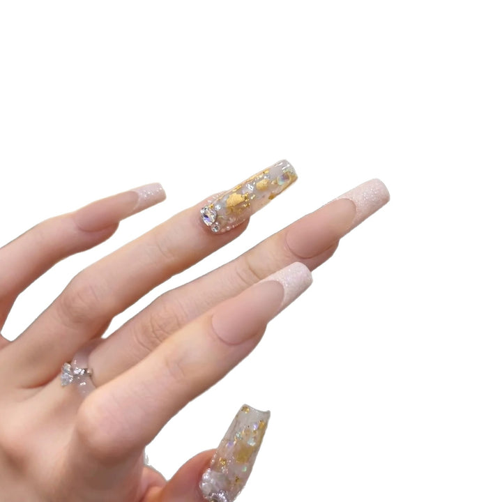 Luxurious Decorative Press-On Nail Set with Artistic Elements Stornfield