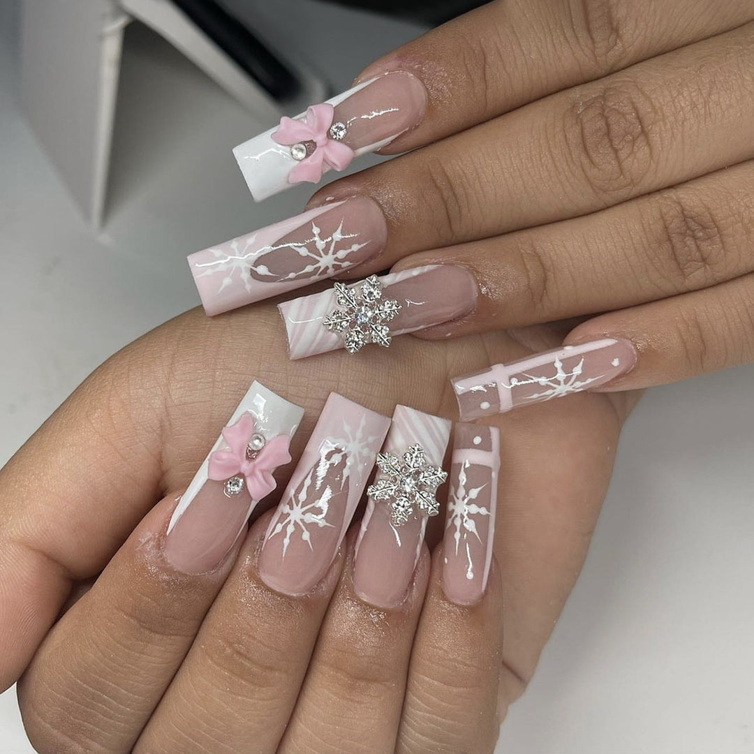 Creative nail art set with filigree snowflake and bow decorations Stornfield