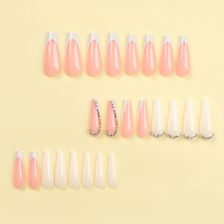 Artful nail extensions with rhinestone embellished accents Stornfield