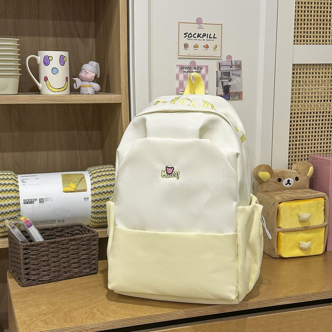 Playful backpack with embroidered Stornfield motif