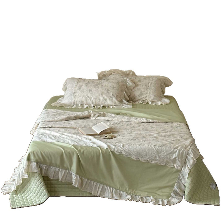 Romantic quilted bedspread and bedding set with ruffle and floral linen look