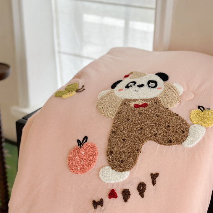 Children's bedding with tufted rabbit appliqué