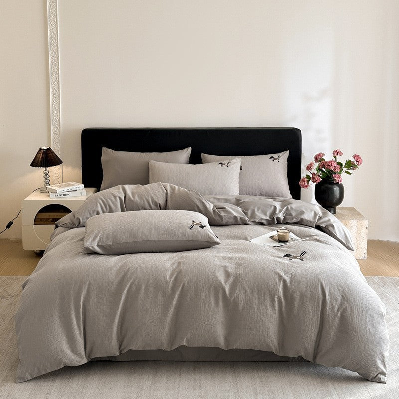 Bedding set in linen look with delicate flower embroidery