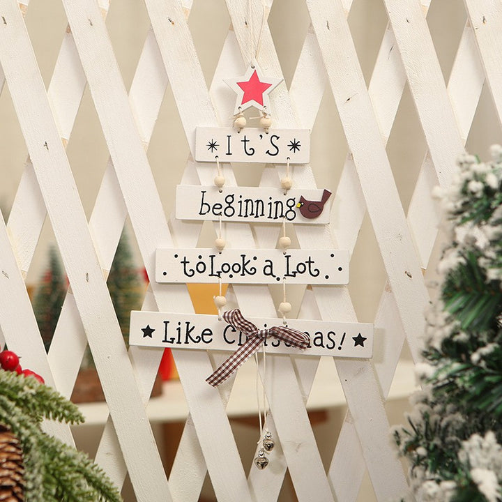 Decorative wooden sign with Christmas greeting Stornfield