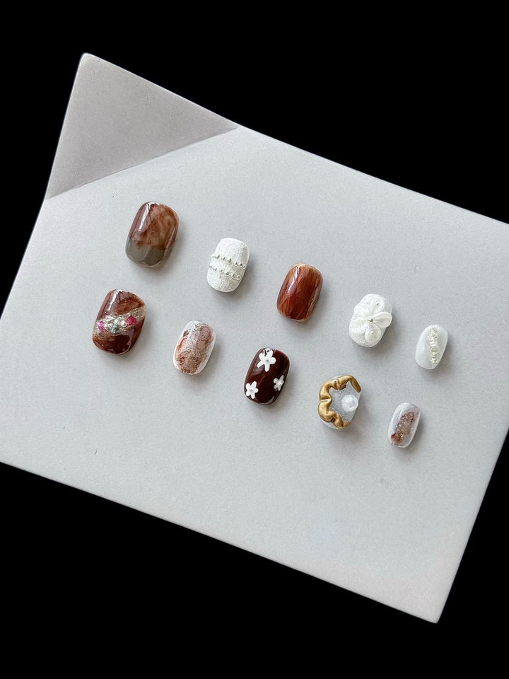 Artistic Press-On Nail Set with Unique Textures and Designs