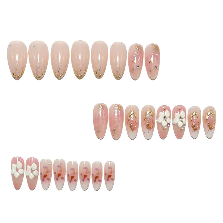 Artificial nails with delicate floral decorations and glitter effects Stornfield