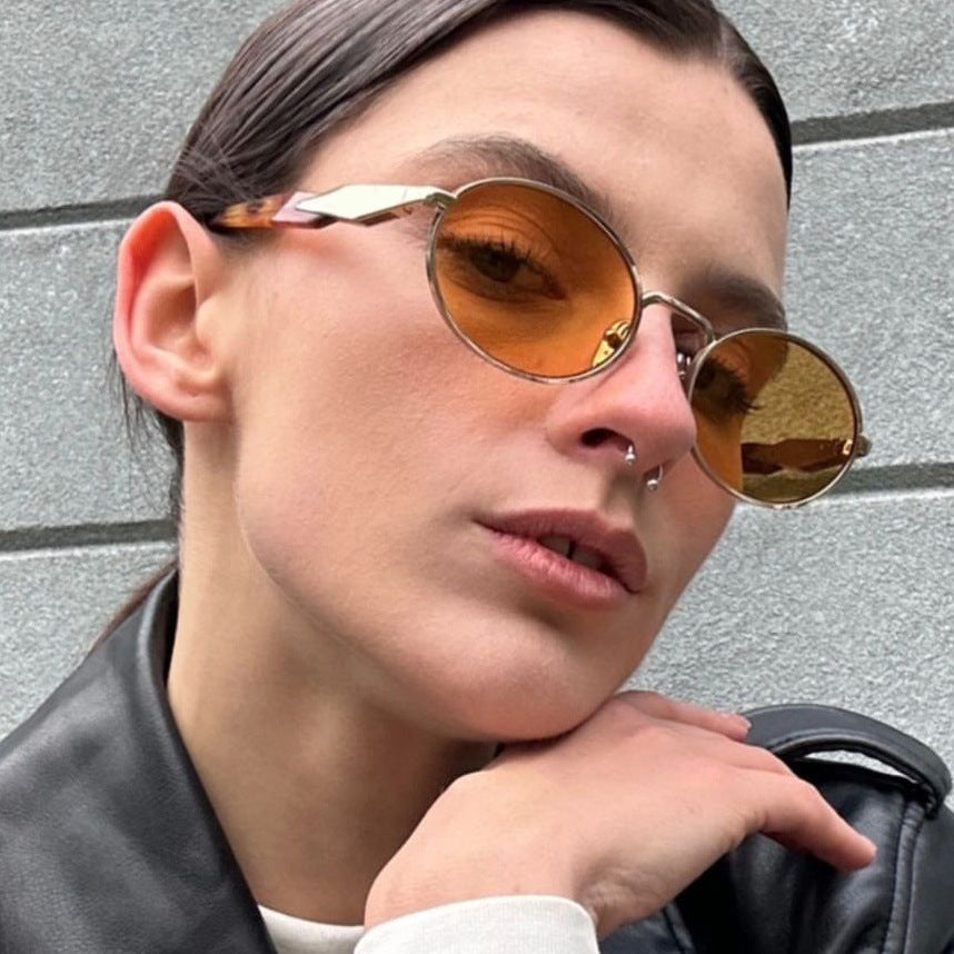 Women's designer sunglasses with unique oval frame and luxurious accents Stornfield