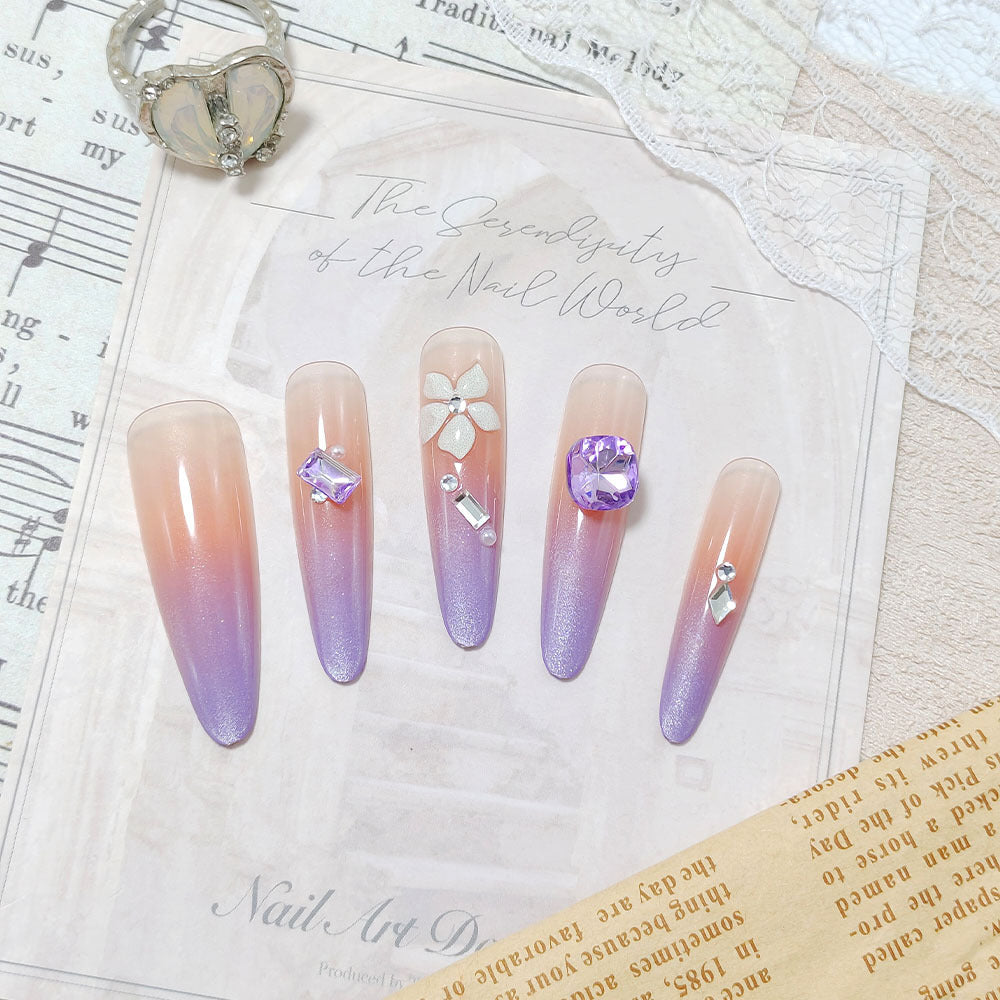 Artistic fingernails with delicate rhinestone details Stornfield