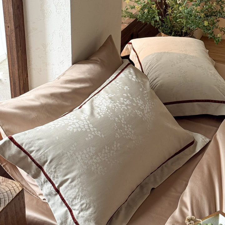 Premium bedding set made of breathable cotton blend with contrasting piping