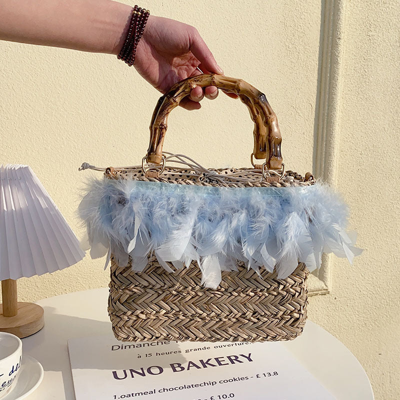 Elegant handbag with feathers and bamboo handles Stornfield