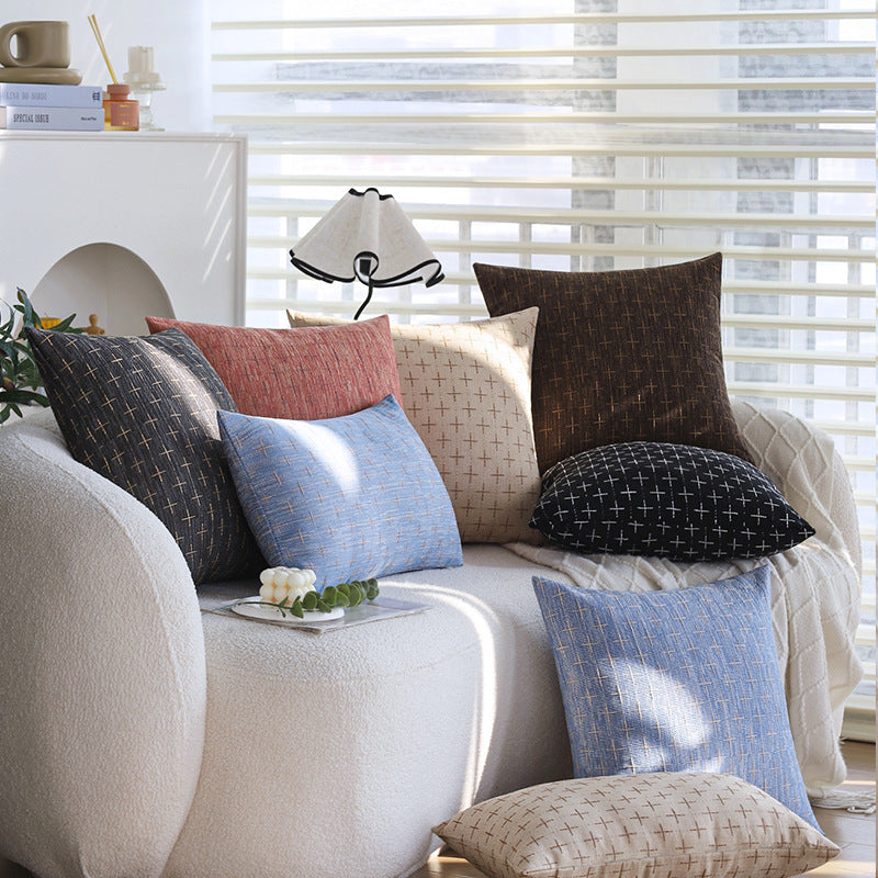 Square cushion cover in Scandinavian minimal style with woven cross pattern and natural linen look Stornfield