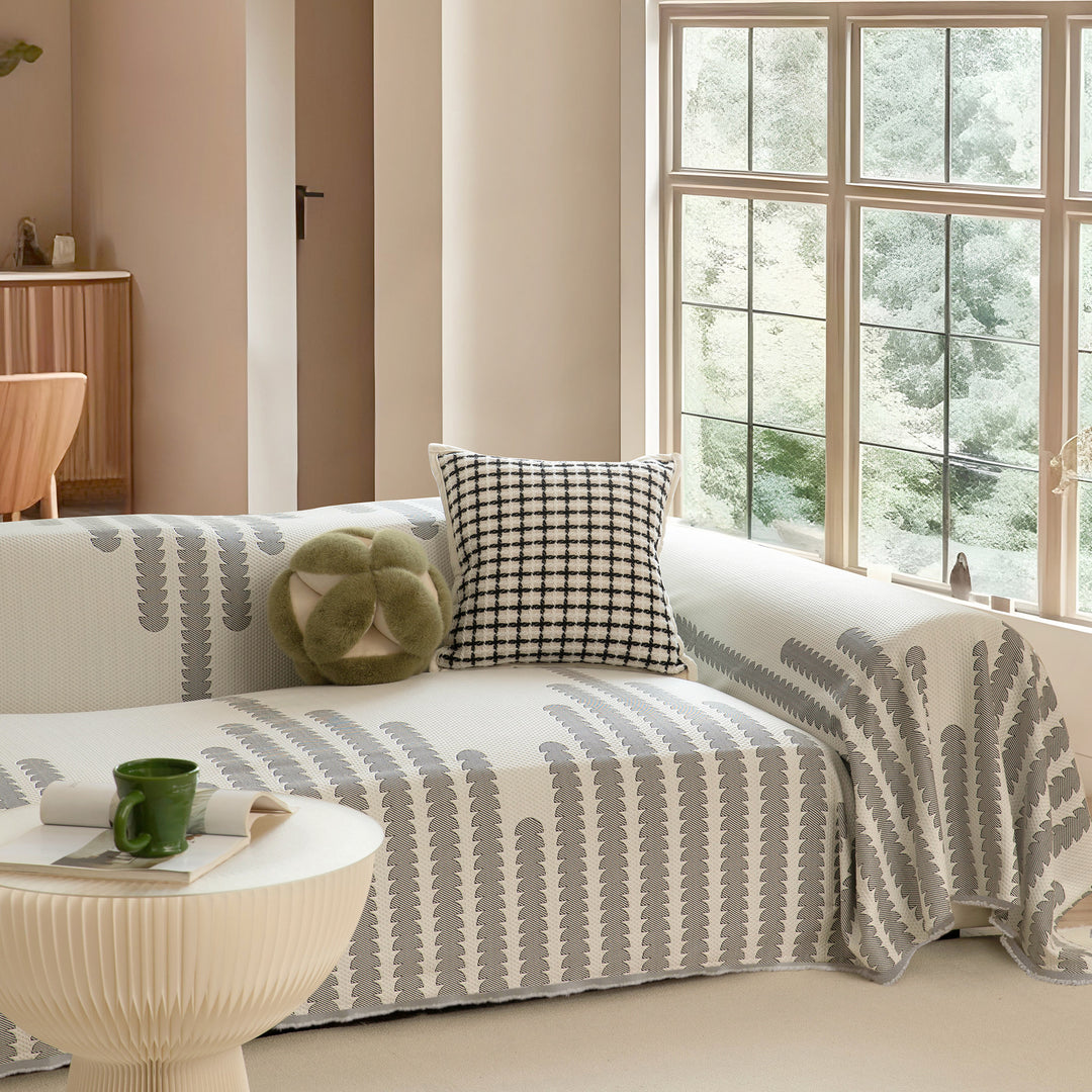 Multi-functional sofa cover and bedspread with woven floral pattern